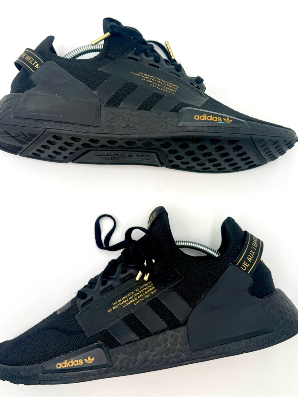 adidas NMD_R1 V2 in the 'Black Gold Metallic' colorway.  NWOT ships next day .